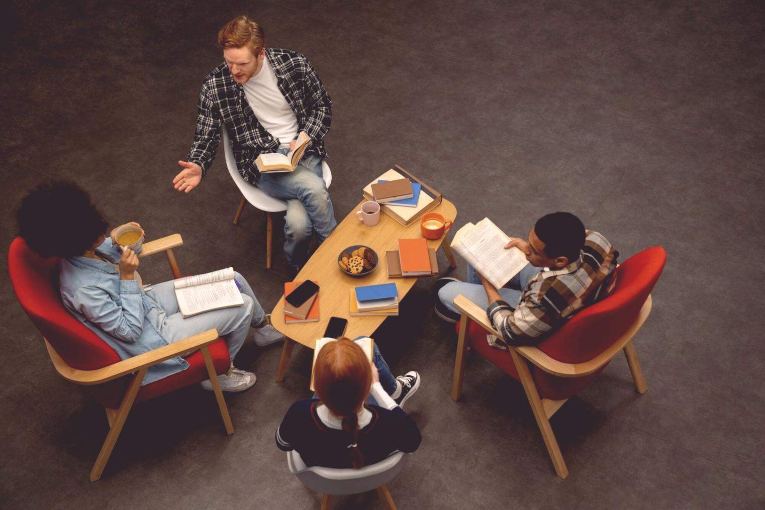 Early workshop session with engaged participants learning investment fundamentals