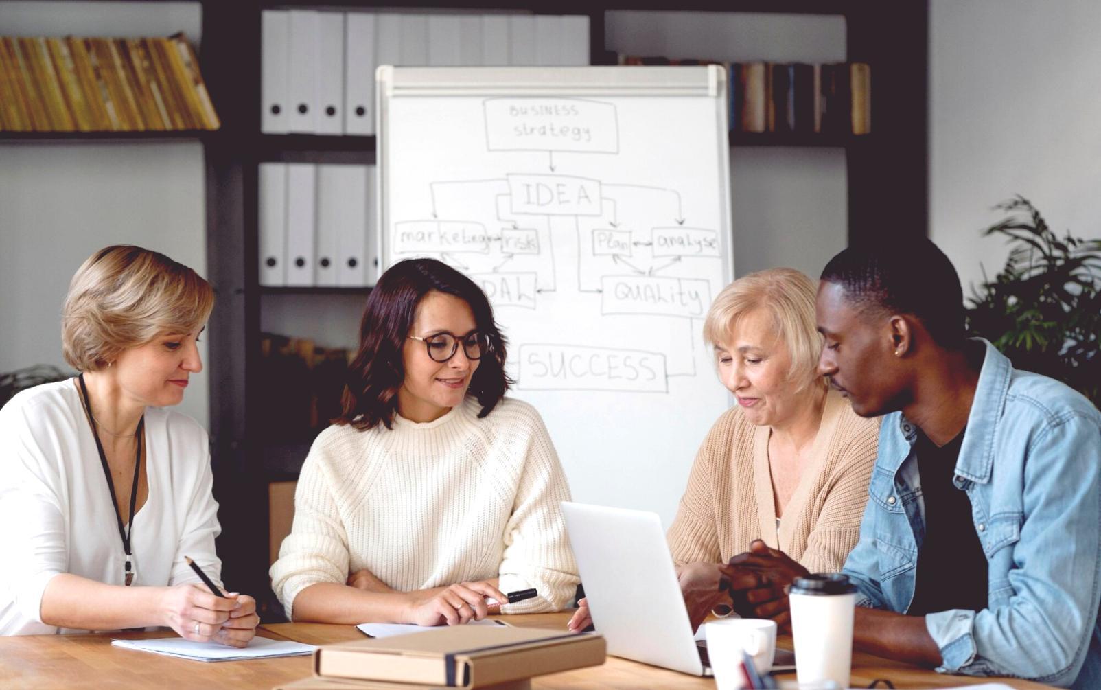 Group of students engaged in interactive investment statistics workshop